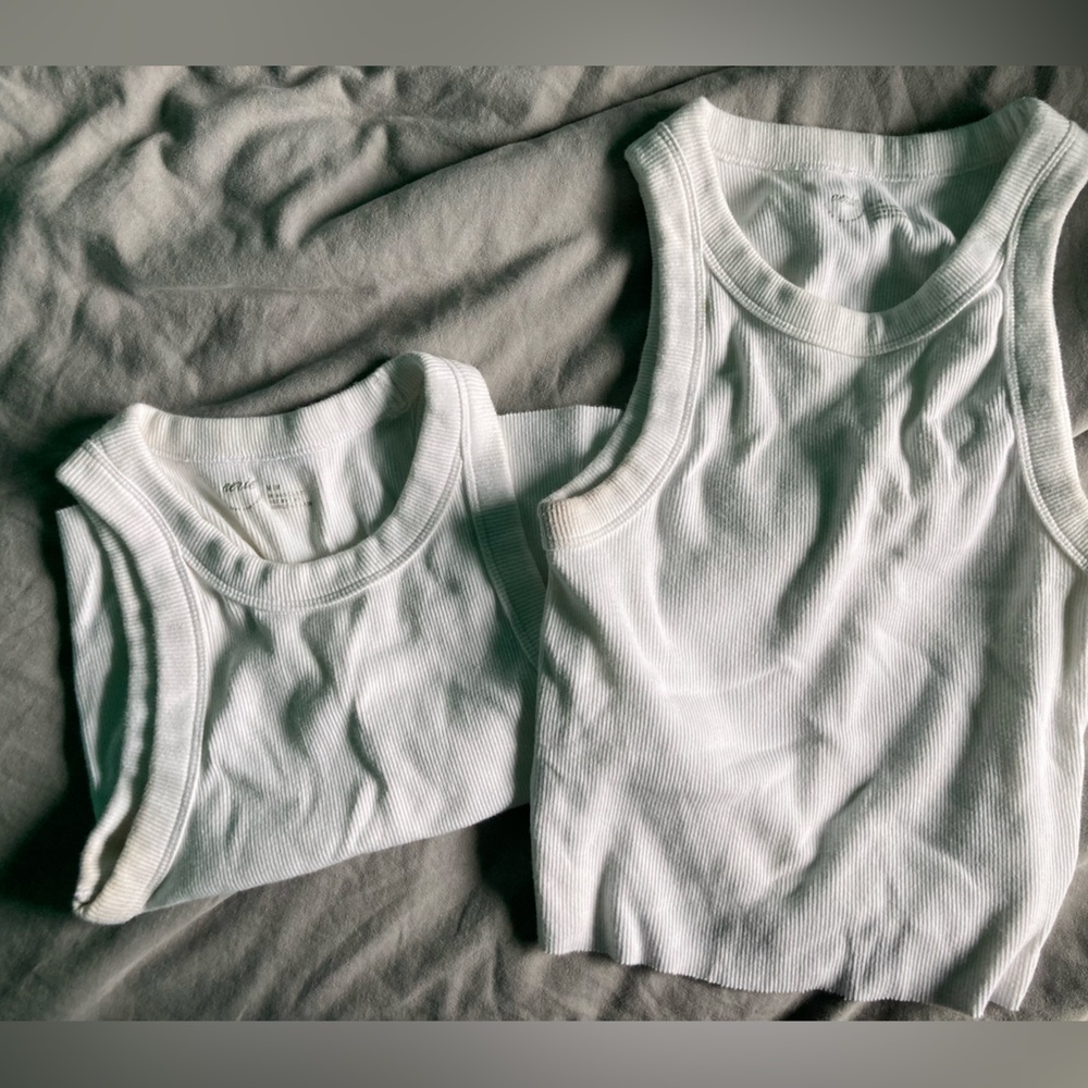 2 white beater tank tops